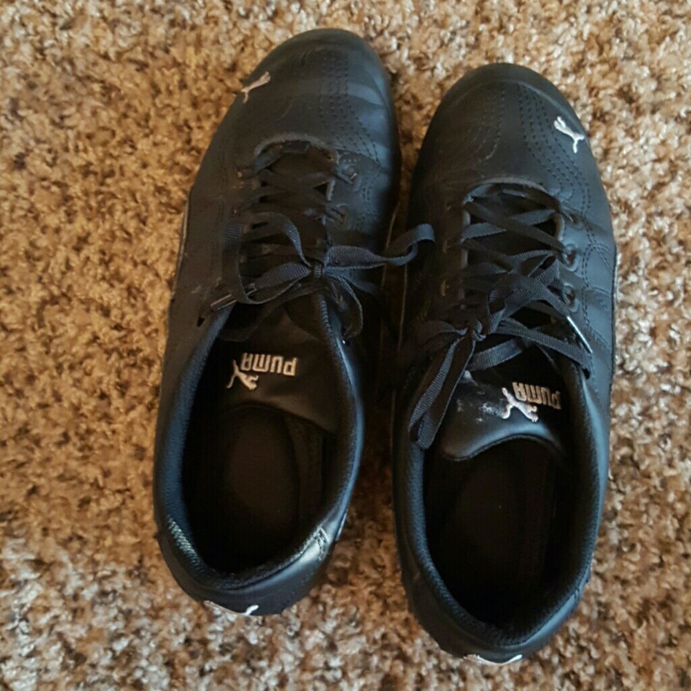 Black Puma sneakers