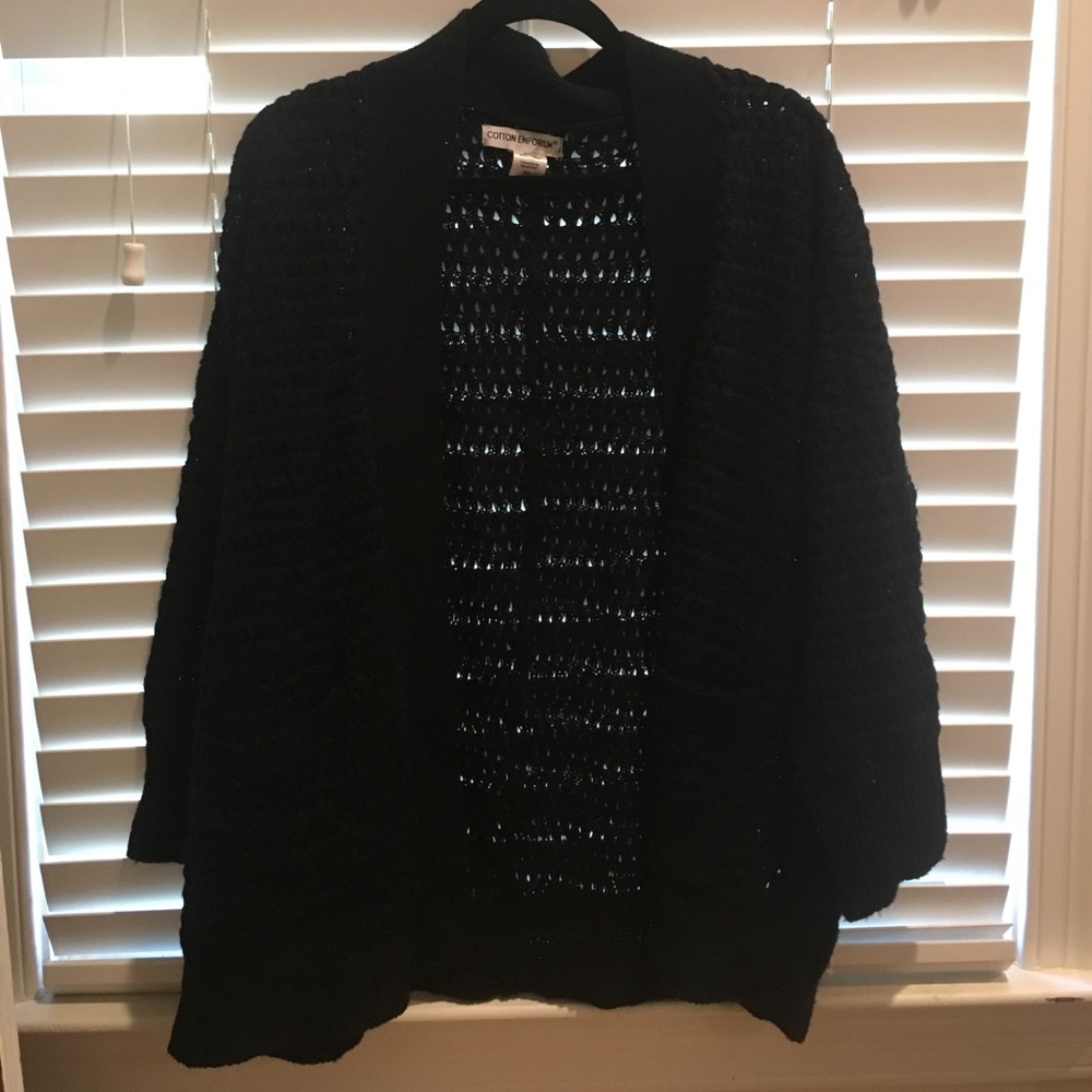 Black knitted sweater.