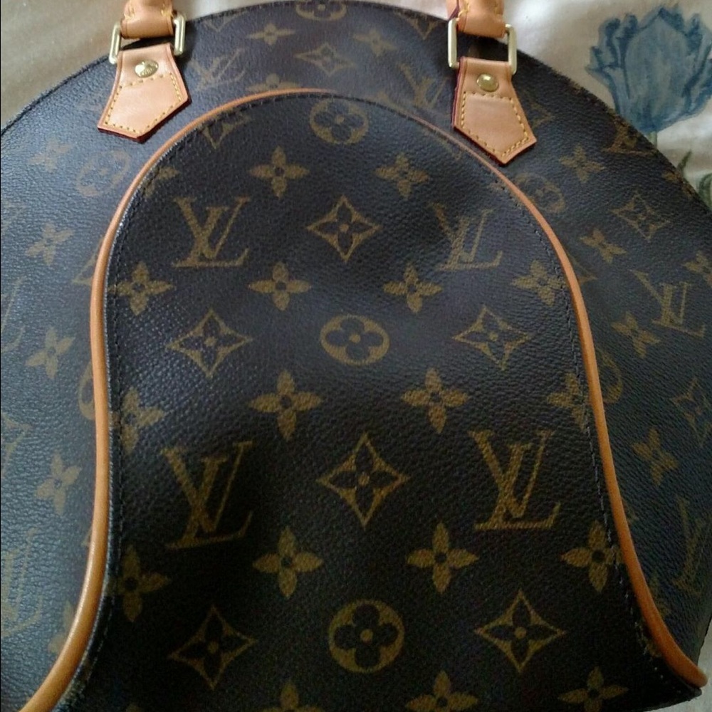 Authentic Louis Vuitton never been used
