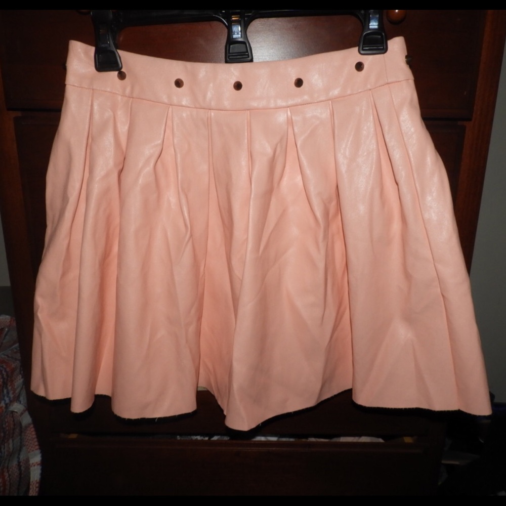 Pink leather shirt with gold studs