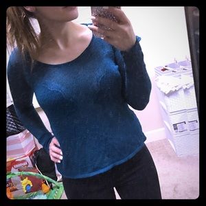 Blue sweater.