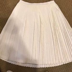 White pleated skirt