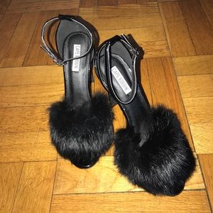 Black fur heels.