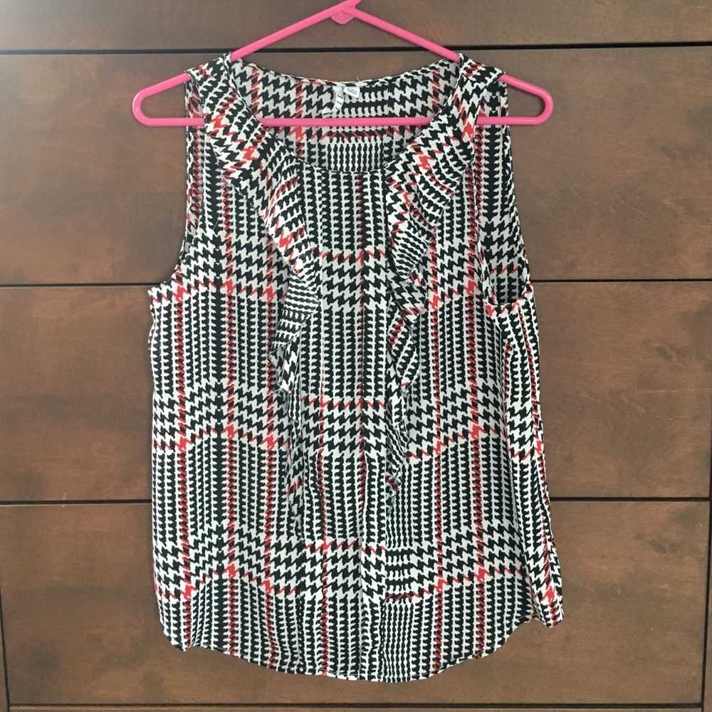 Elle sleeveless ruffle front top