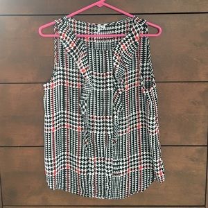 Elle sleeveless ruffle front top