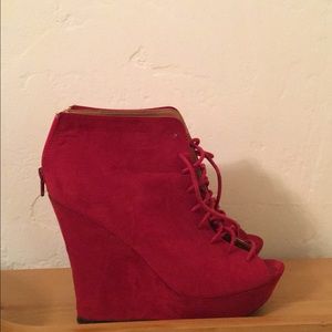 Red wedge heels that lace up in the front!