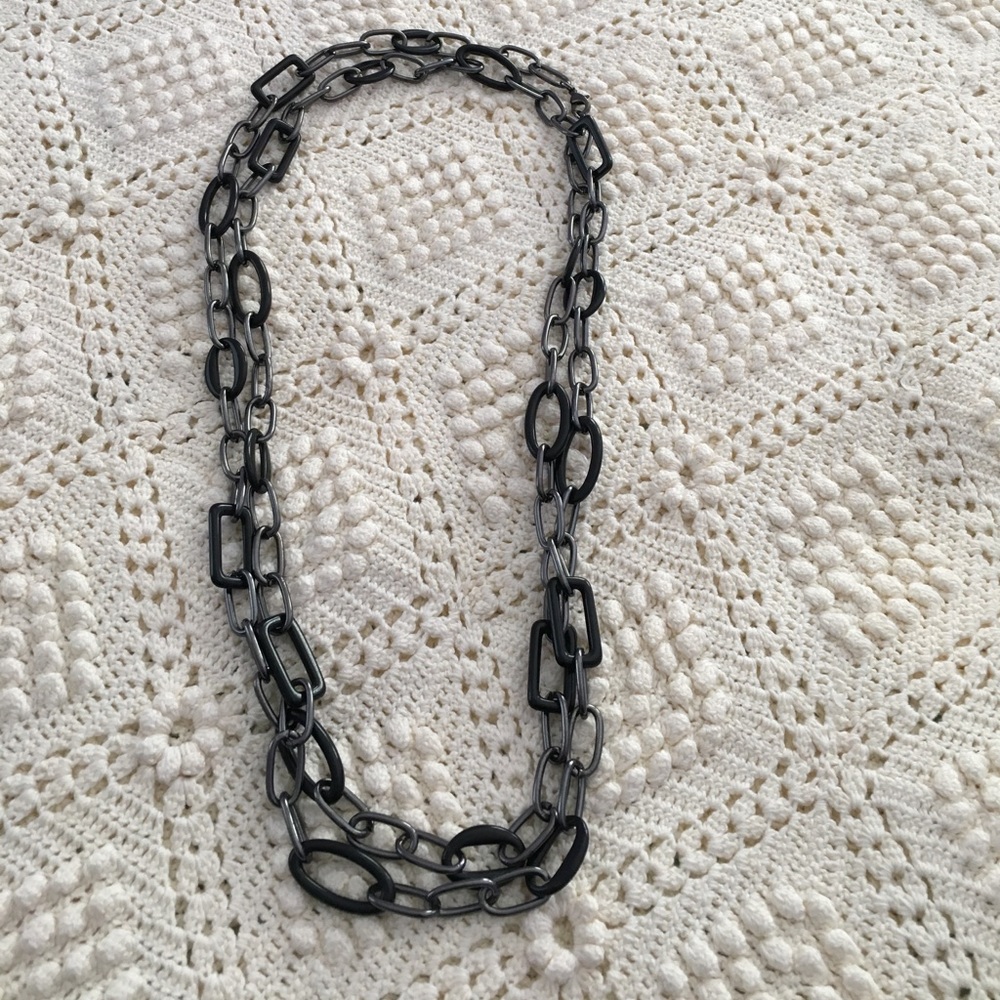 Black and silver chain link necklace.