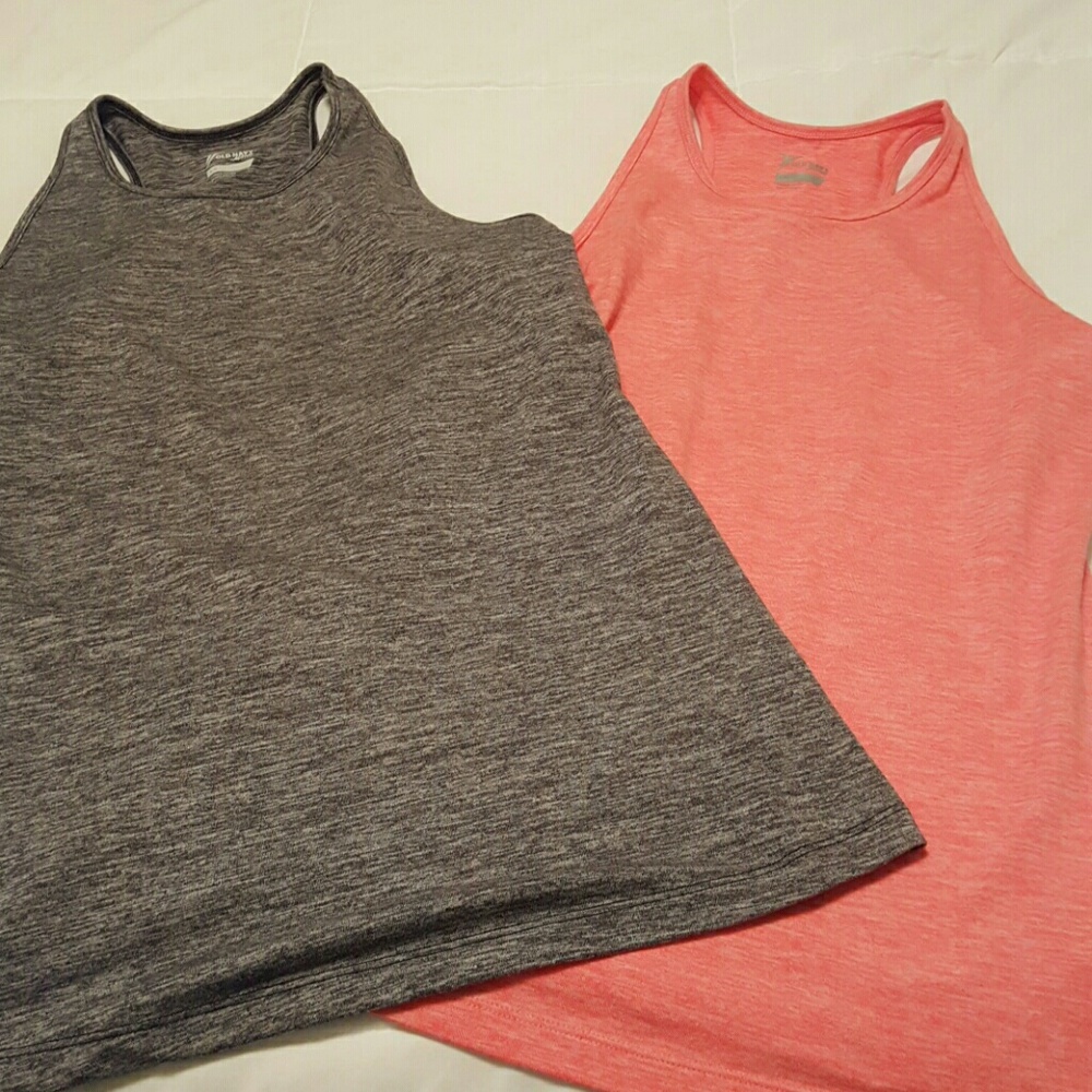 Four workout tanks.