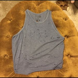 Free people cropped destroyed tank.