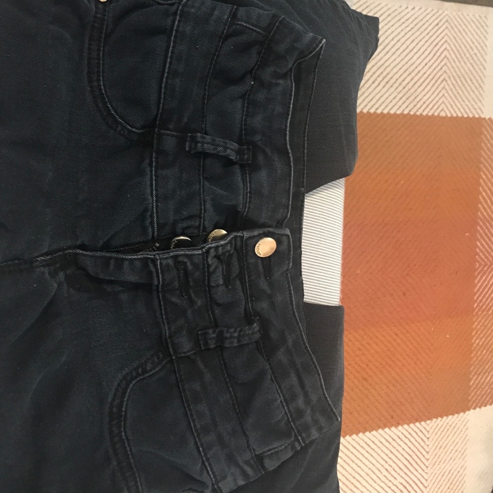 High-waisted, black wash jeans