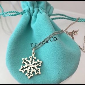 Rare, Tiffany and Co. silver snow flake necklace