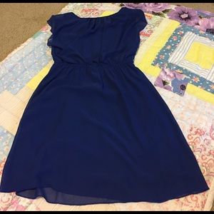 Cute navy dress. Sheer lining. Size medium