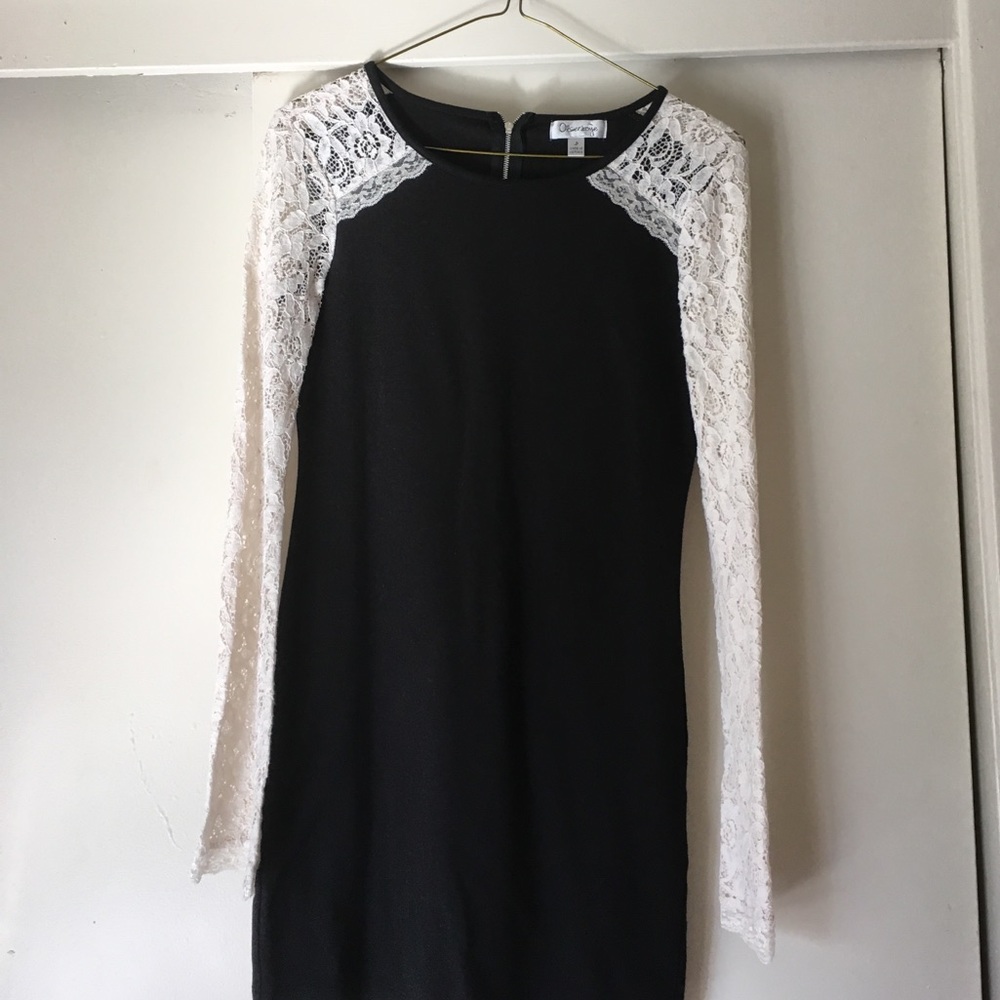 Black tight dress with white lace sleeves