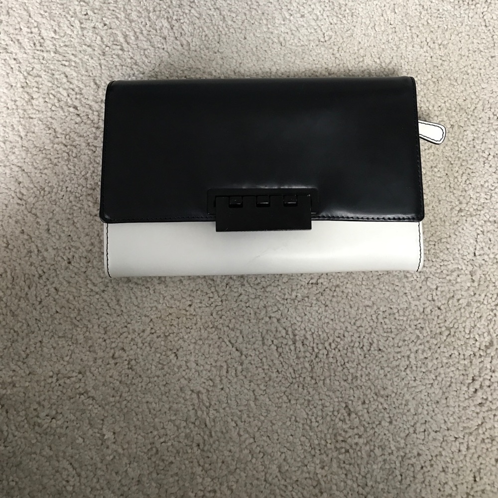 Z spoke zac Posen travel clutch