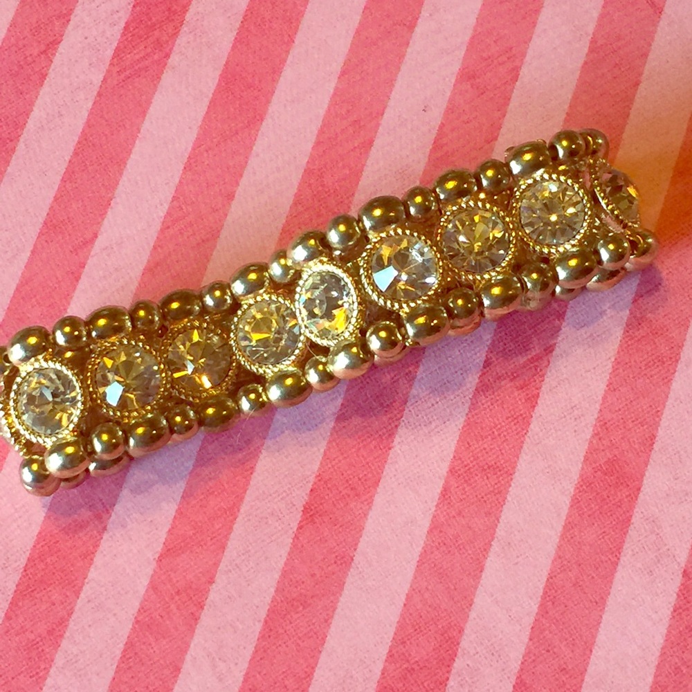 stretch gold bracelets with clear stones.