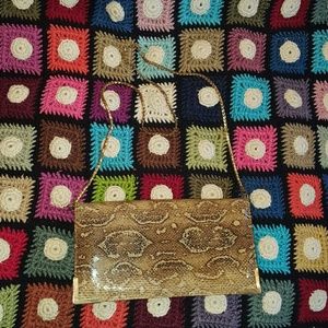 GENTLY WORN SNAKE SKIN BAG WITH GOLD CHAIN