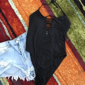 Black caged one piece