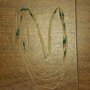 5 strand necklace with crystals.