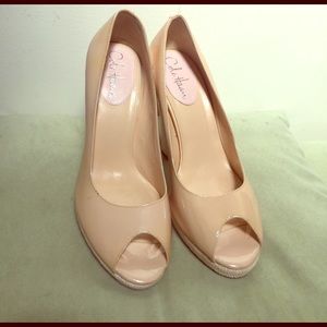 Cole Haan. Col. Blush.  a bit of discoloration.