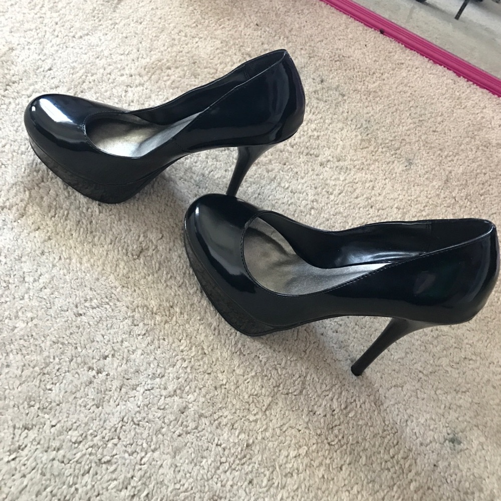 Black platform pumps
