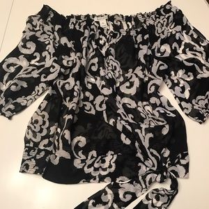 100% Silk Blouse with tie. Very elegant and light!