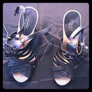 Black strappy leather coach shoes