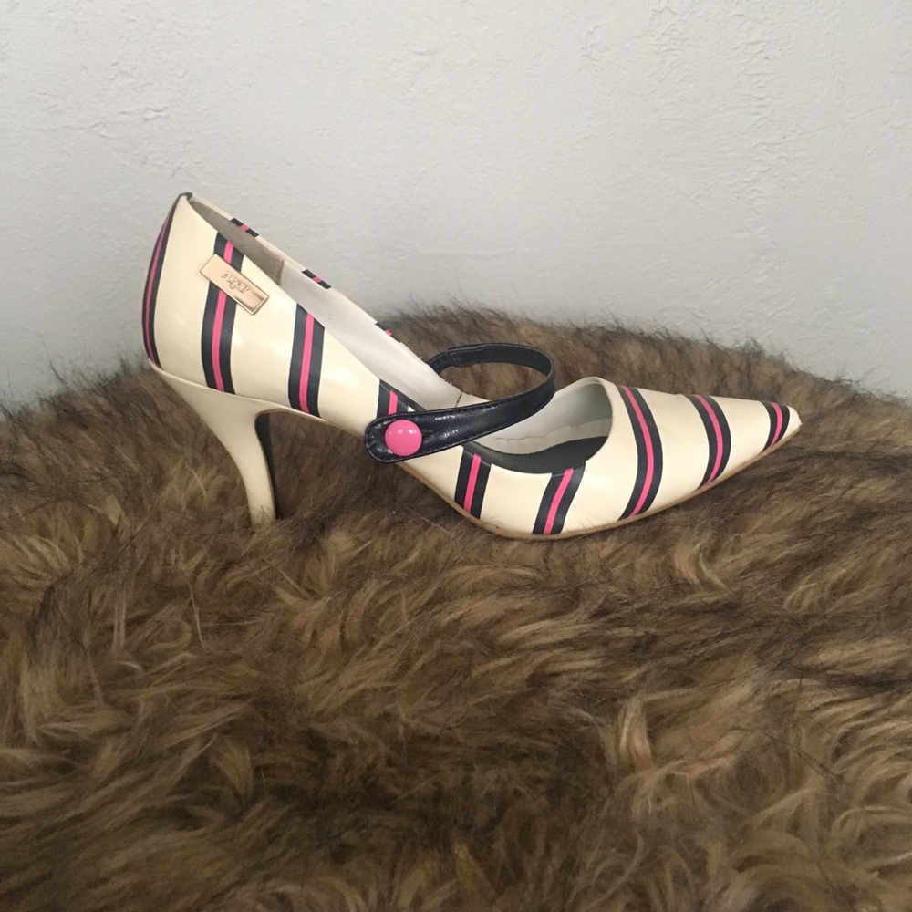 Cream heel with pink and blue stripes.
