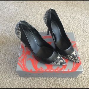 Kelsi Dagger black snake skin on tip and heel pump