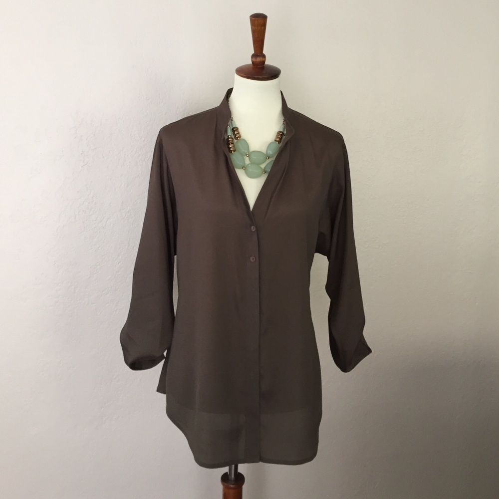 Beautiful blouse with stand up collar