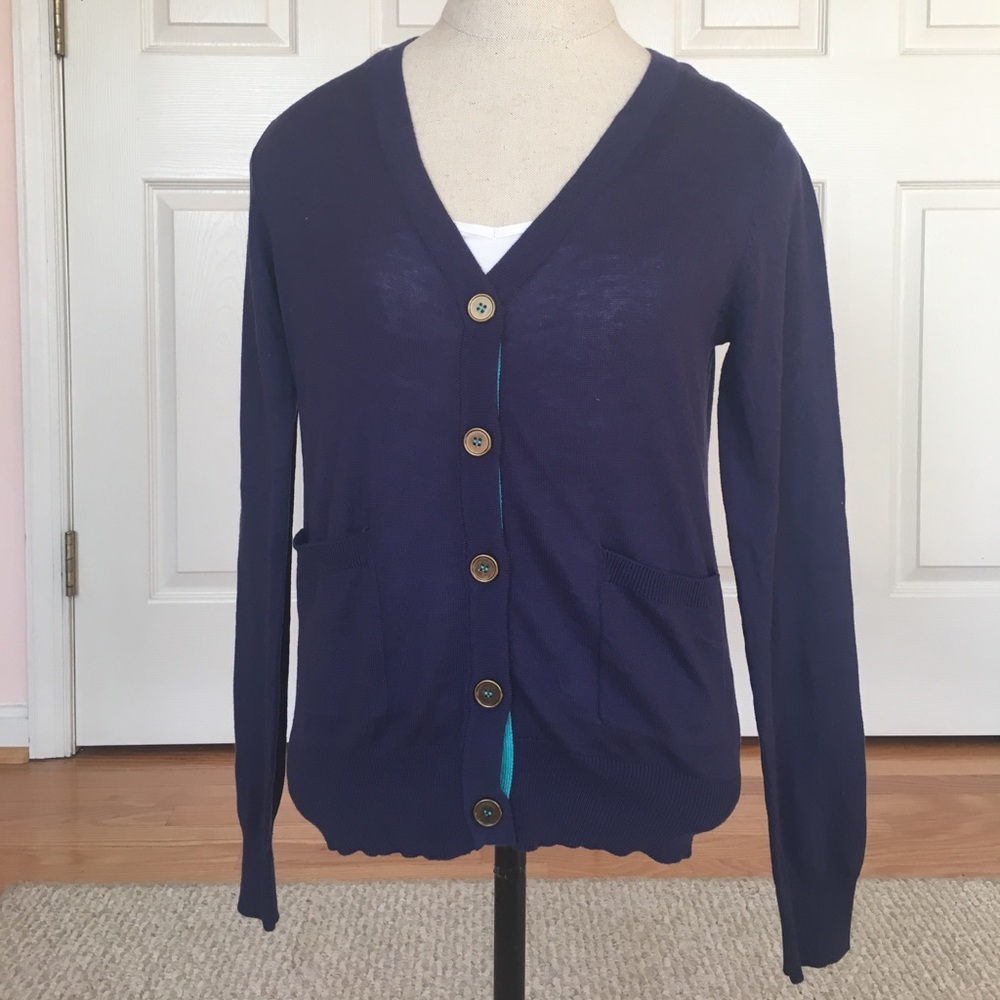 Blue cardigan with gold buttons