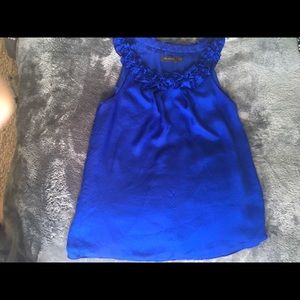 Sleeveless blue blouse