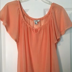 Peach colored shirt. Size small