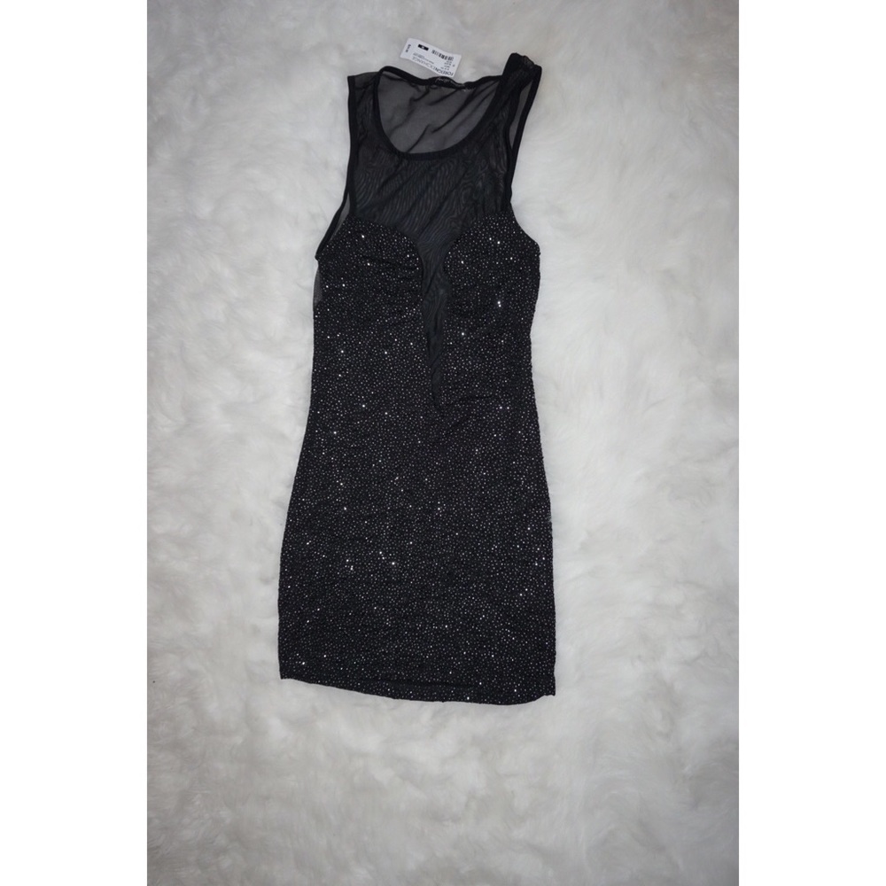 Sheet back Dress. NEW with tags