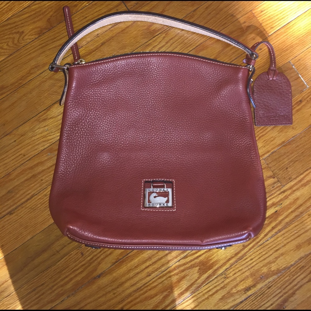 Authentic Dooney & Bourke Burgundy Shoulder Bag.