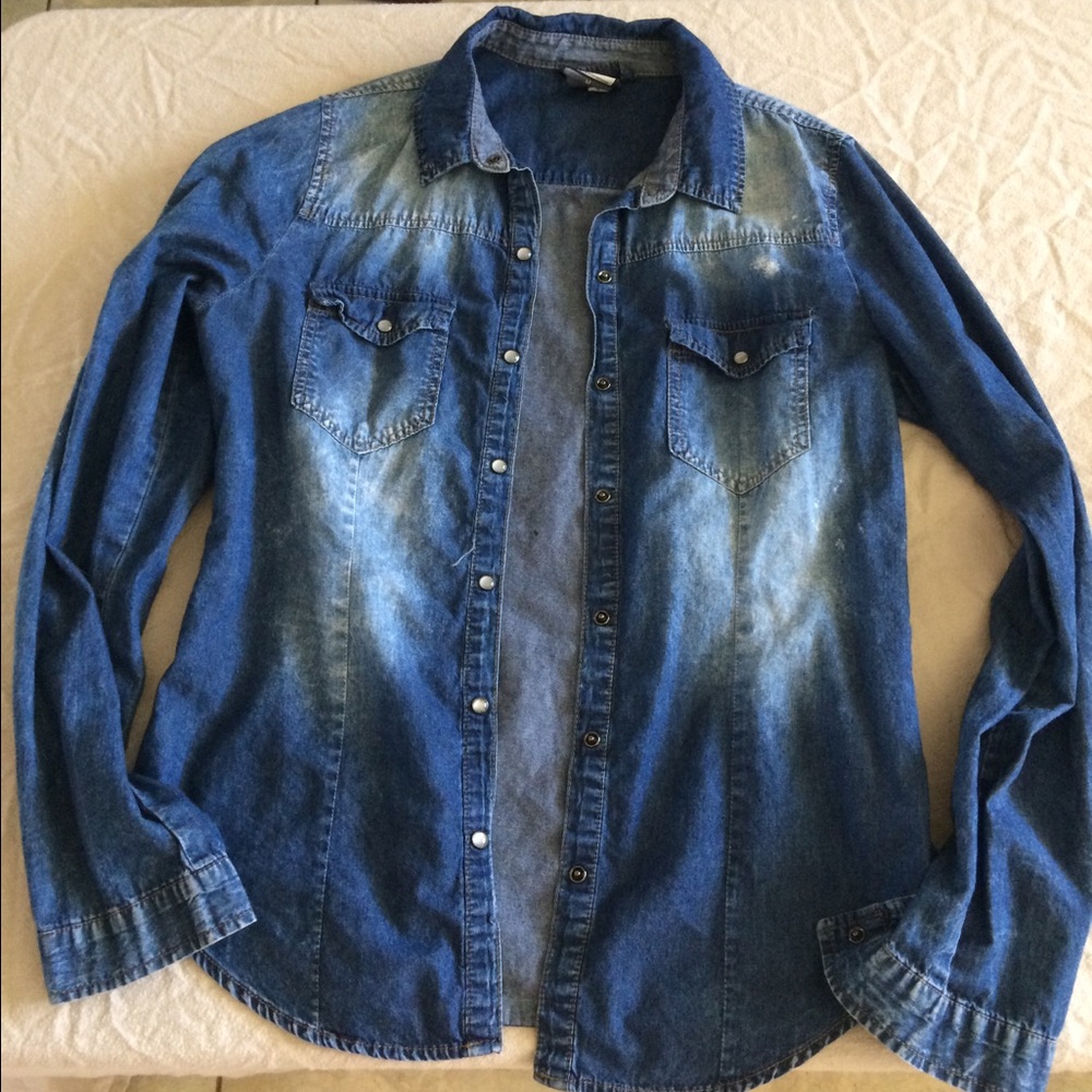 Blue jean button up shirt.