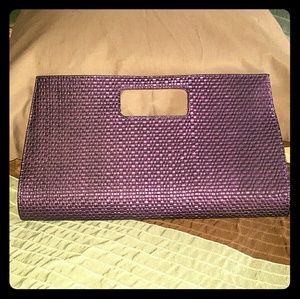 Purple evening bag with magnetic snaps
