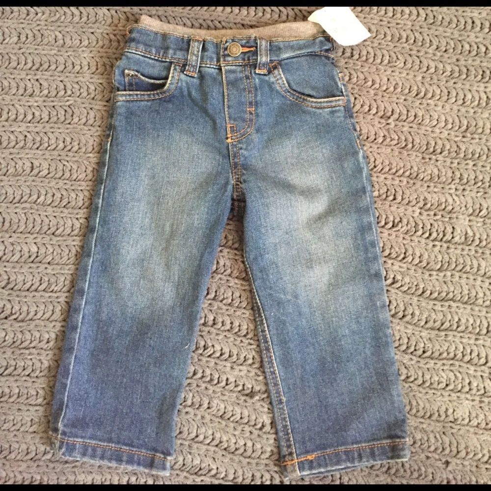Carter's mini blues jeans. New with tag. 18 months