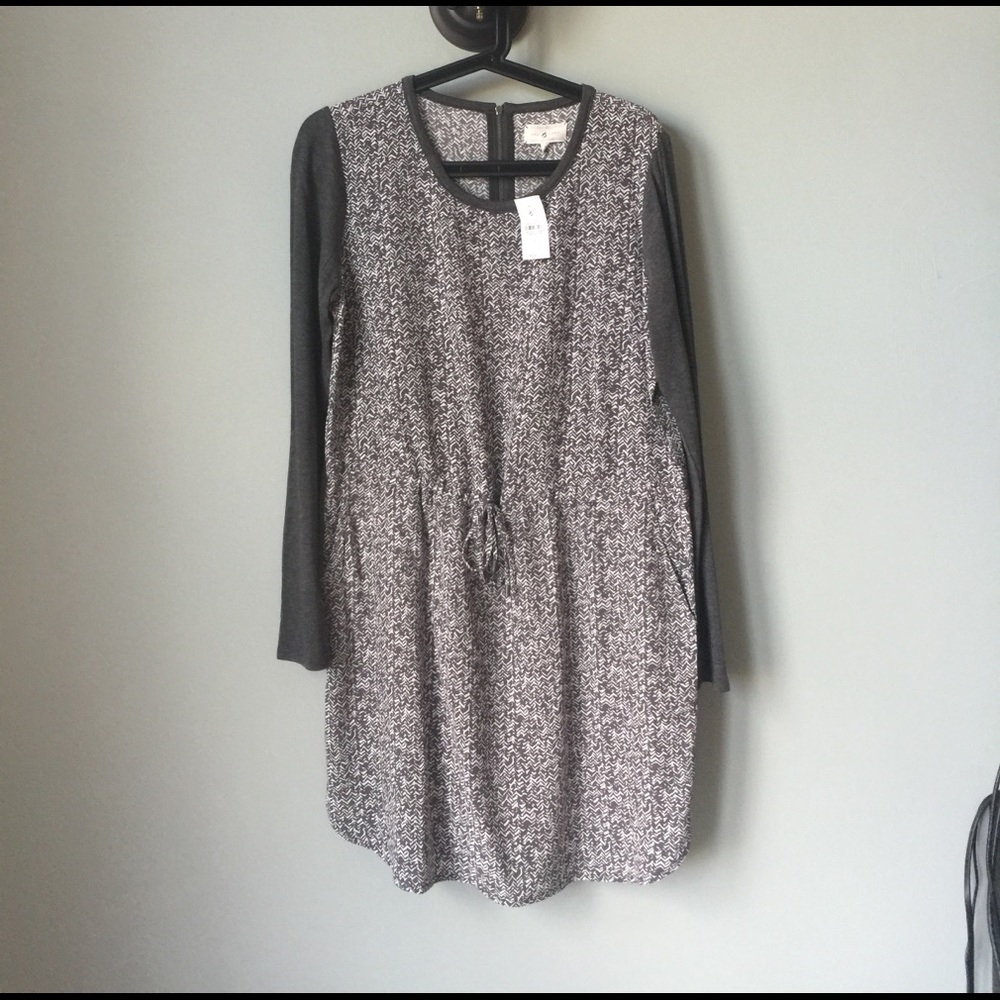 Long sleeved dress /drawstring waist / pockets.