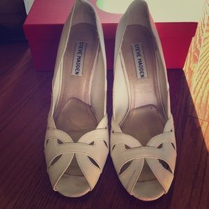 Steve Madden's white peep toes stilettos