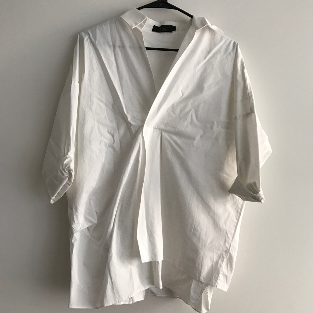 Chic oversized white asymmetric white blouse