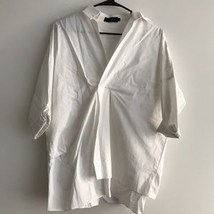 Chic oversized white asymmetric white blouse