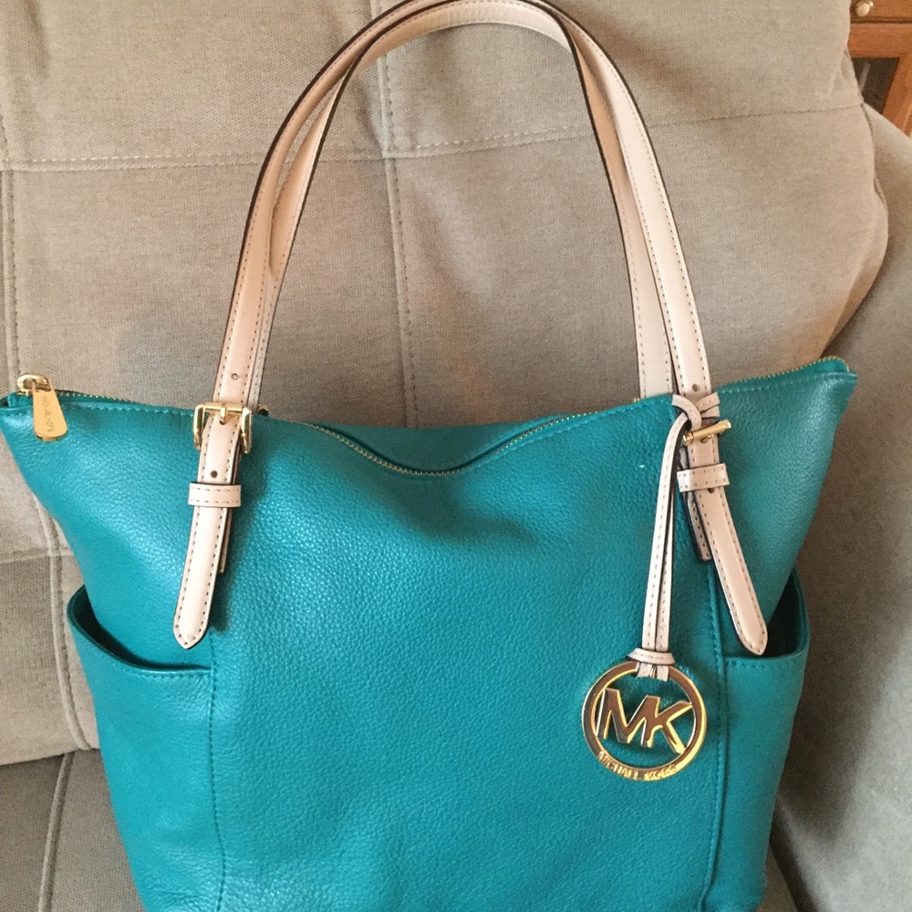 GENTLY used Authentic Teal Michael Kors Bag!