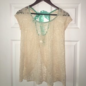 Cream open back lace top with mint green bow