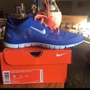 Size 8 brand-new Nike Tennies in original box