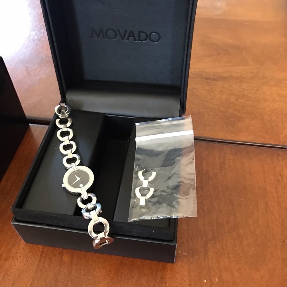- sold locally -Movado ladies watch with diamond