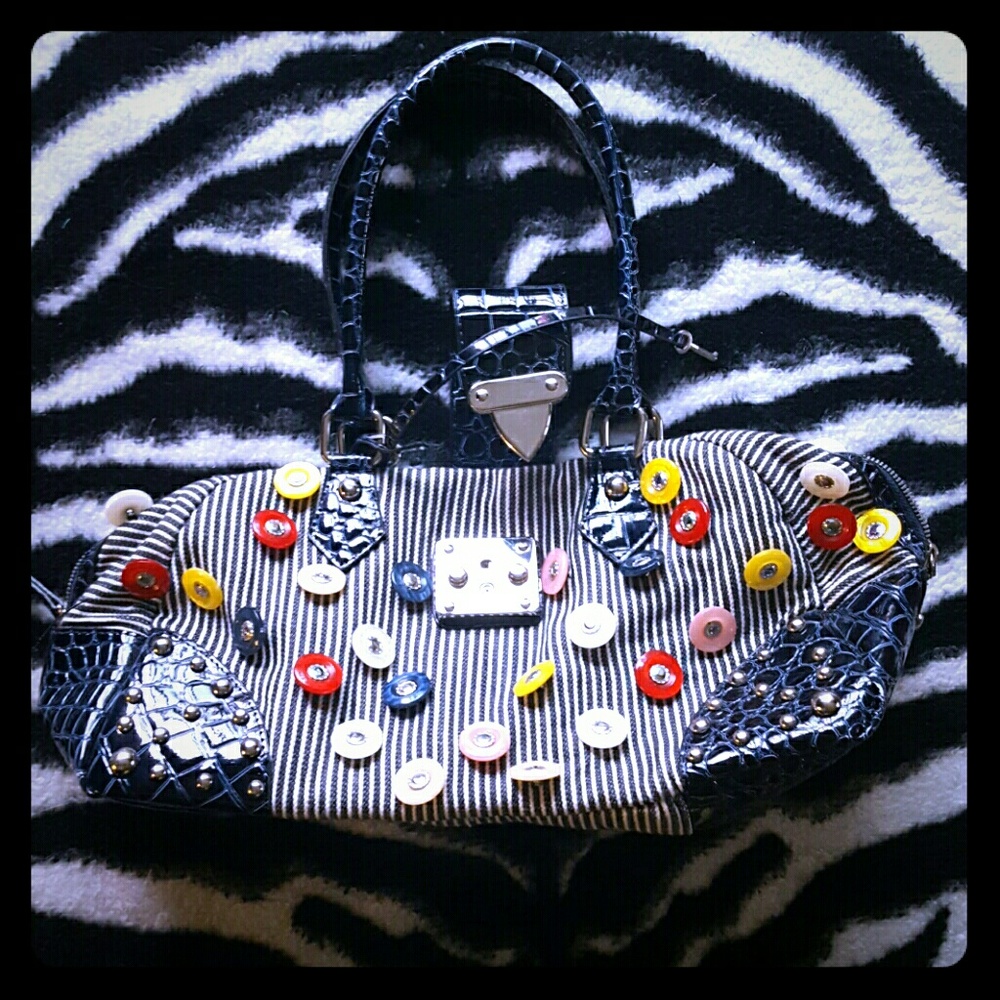 Unique "in's Handbags inc." Locking Handbag