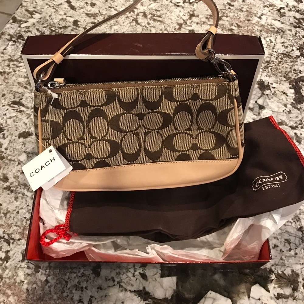 Brand new khaki color coach clutch🎀