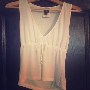 White, semi-sheer Versace Jeans Couture crop top.