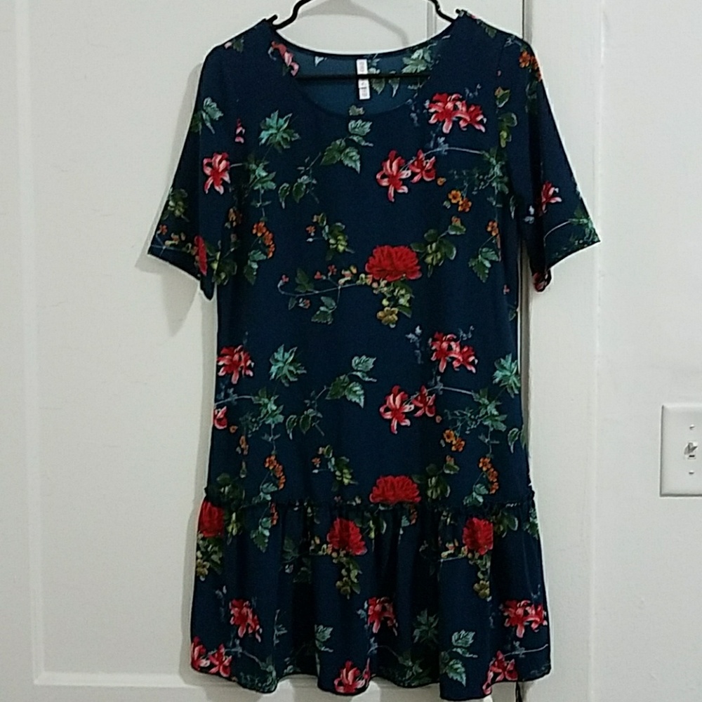 Vintage floral dress with peplum hem