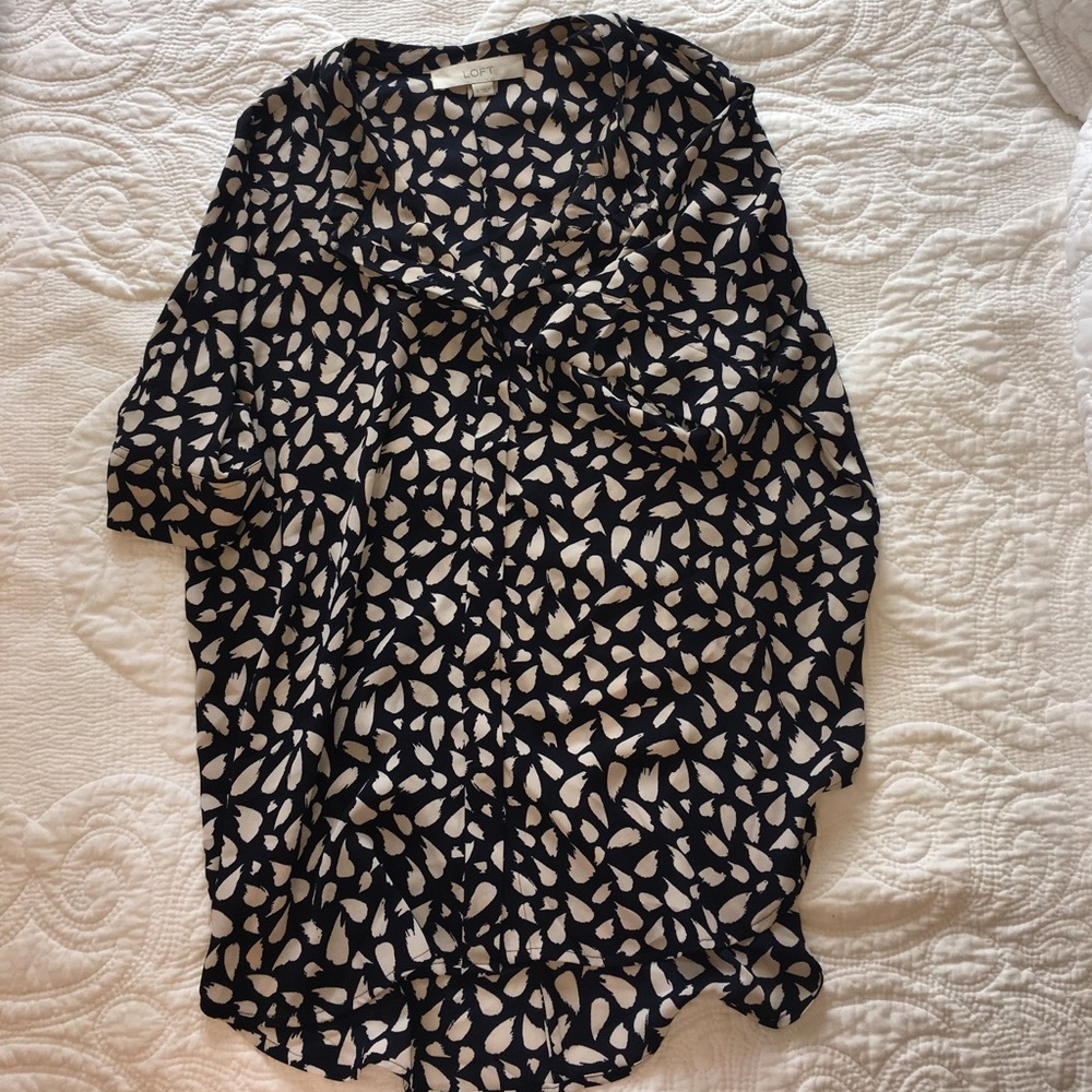 Printed silk blouse perfect for any occasion.